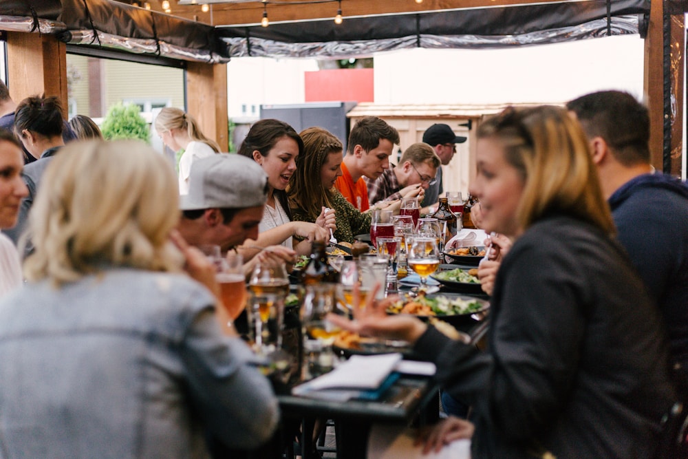 Friends sharing food and conversation around a table